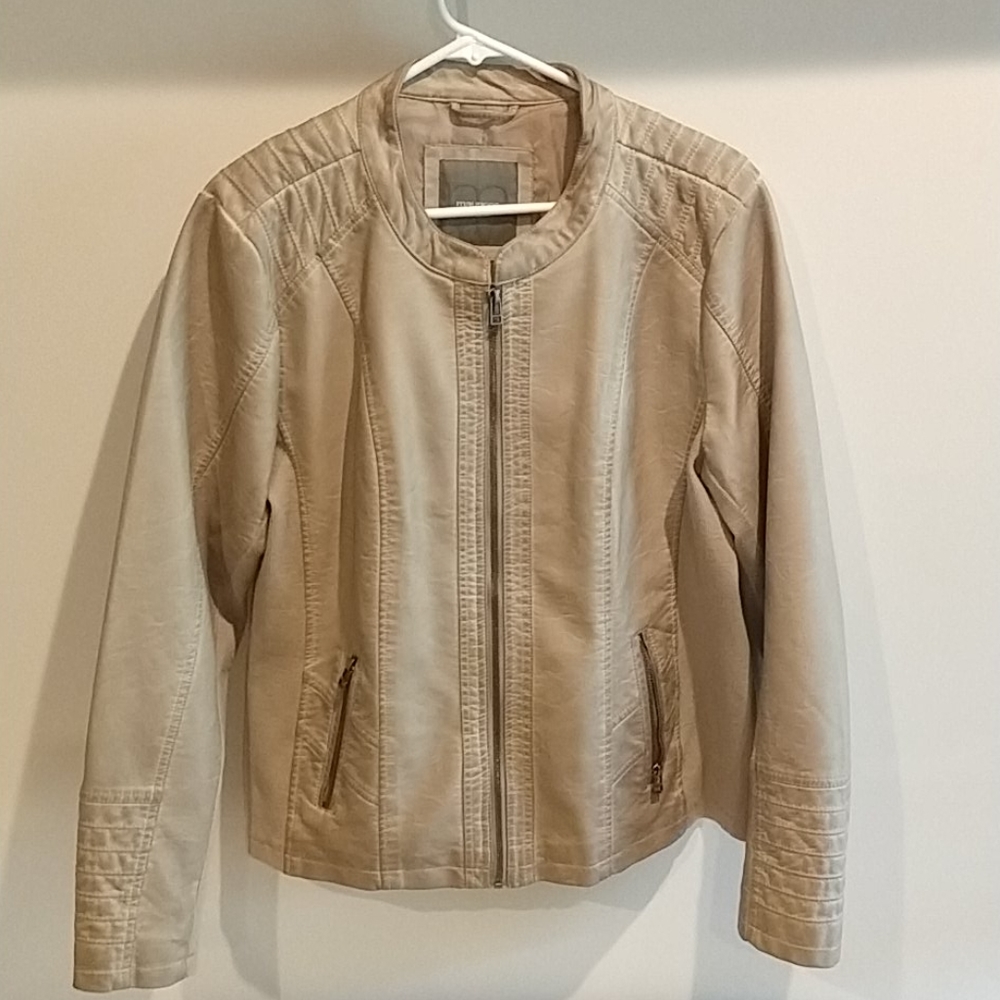 Leather coat with cloth siding